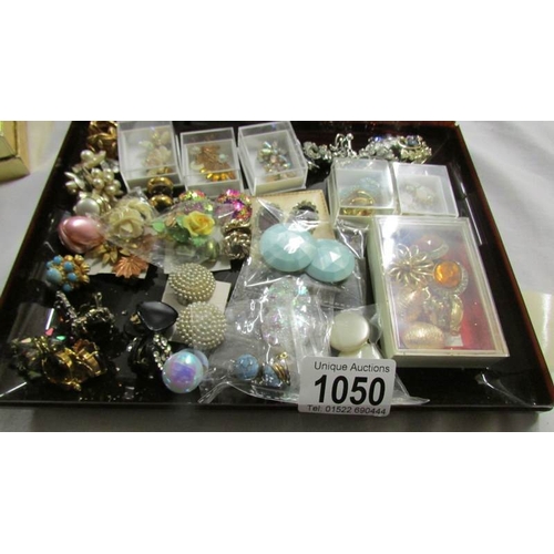 1050 - A good lot of assorted clip on earrings.