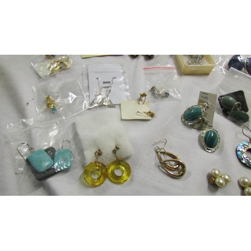 1053 - Approximately 30 pairs of earrings including clip on.