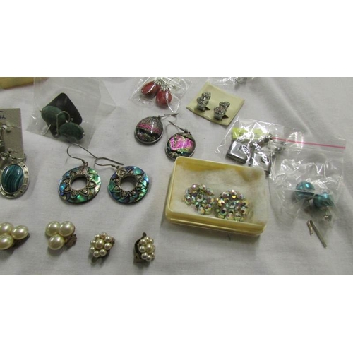 1053 - Approximately 30 pairs of earrings including clip on.