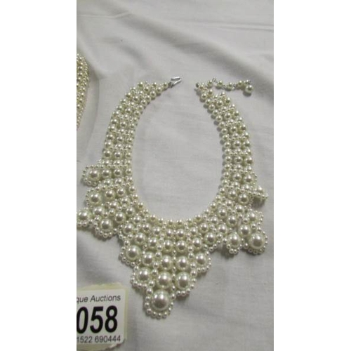 1058 - Two pearl coloured chokers.