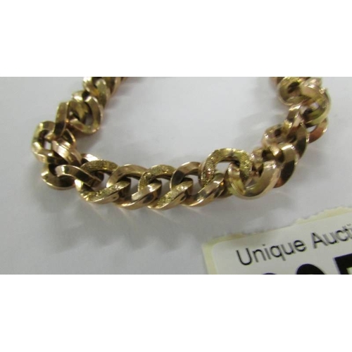 2053 - A 9ct gold chain with 9ct gold padlock, 20.3 grams.