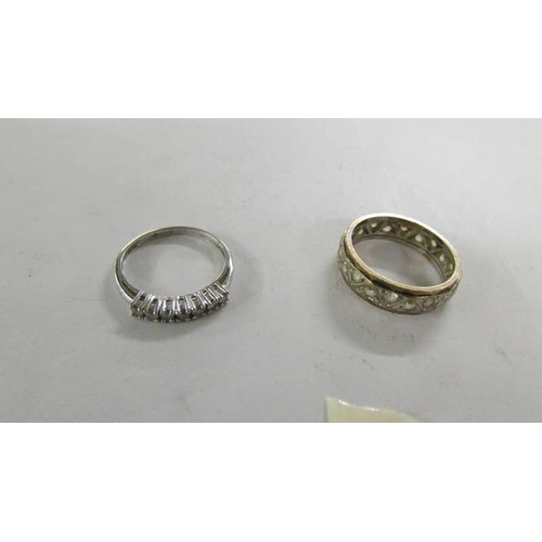 2068 - A silver eternity ring and 2 other rings.