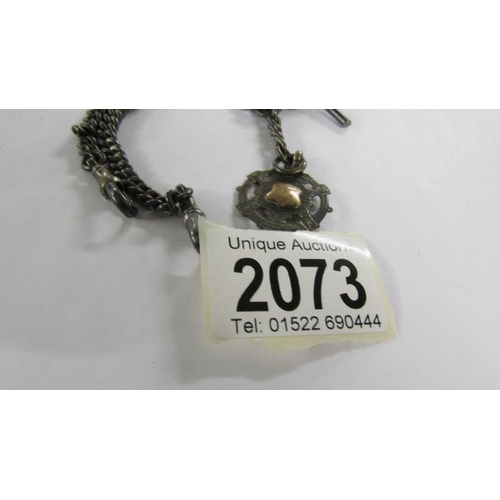 2073 - A silver watch albert chain with silver fob, 43 grams.