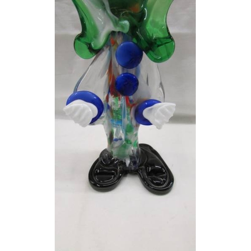 2076 - A tall multi coloured glass clown and a smaller example in the style of Murano, 14'' (35cm) and 9'' ... 