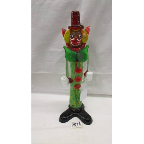 2076 - A tall multi coloured glass clown and a smaller example in the style of Murano, 14'' (35cm) and 9'' ... 