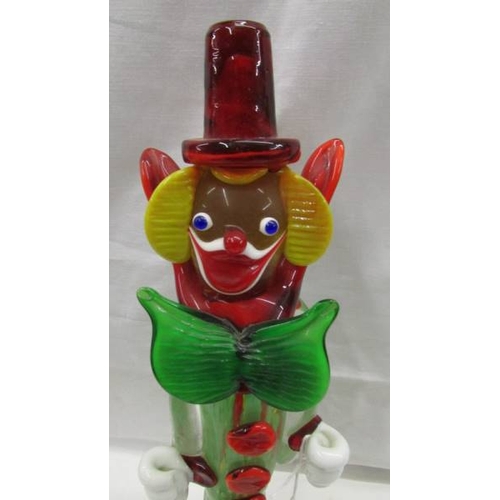 2076 - A tall multi coloured glass clown and a smaller example in the style of Murano, 14'' (35cm) and 9'' ... 