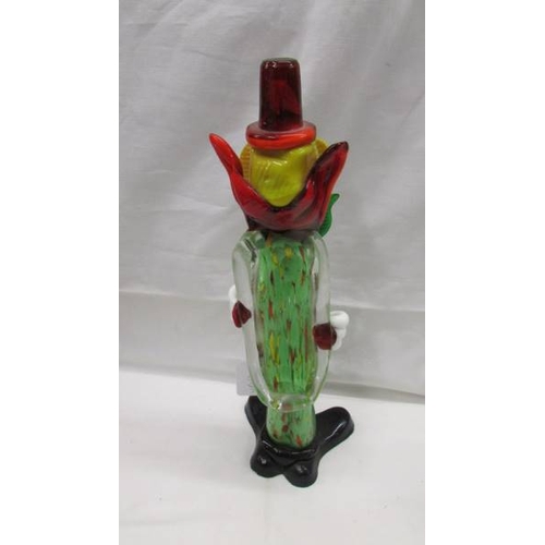 2076 - A tall multi coloured glass clown and a smaller example in the style of Murano, 14'' (35cm) and 9'' ... 