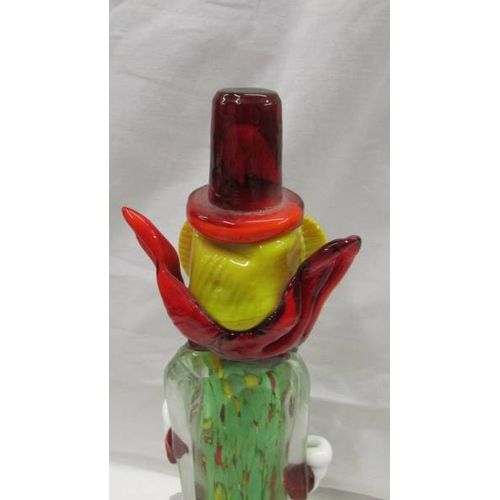 2076 - A tall multi coloured glass clown and a smaller example in the style of Murano, 14'' (35cm) and 9'' ... 