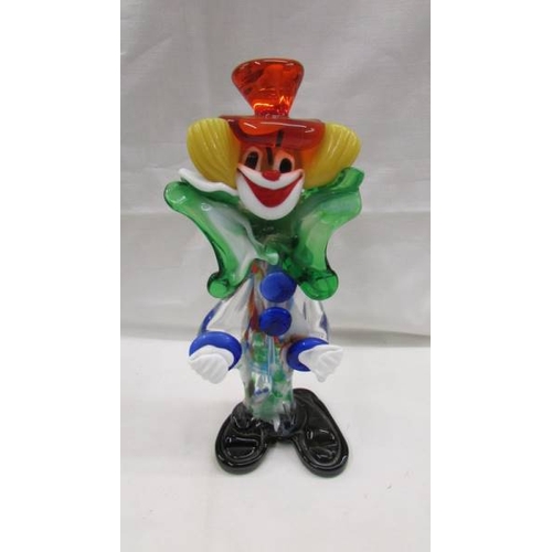 2076 - A tall multi coloured glass clown and a smaller example in the style of Murano, 14'' (35cm) and 9'' ... 