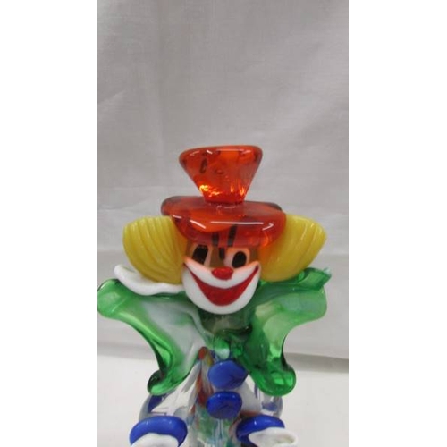 2076 - A tall multi coloured glass clown and a smaller example in the style of Murano, 14'' (35cm) and 9'' ... 