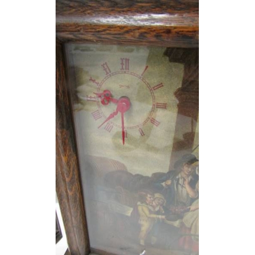 2090 - Two unusual oak framed picture clocks with battery movements, both in working order.