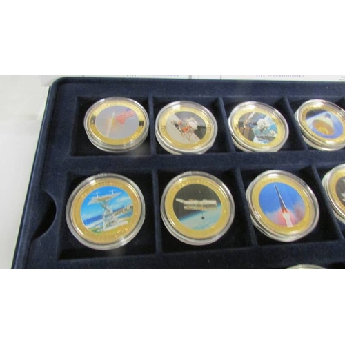 2161 - A cased set of 36 gold plated one dollar coins from The History of Space Exploration series with cer... 