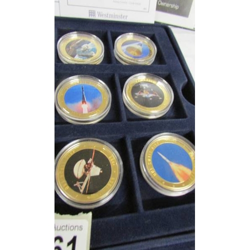 2161 - A cased set of 36 gold plated one dollar coins from The History of Space Exploration series with cer... 