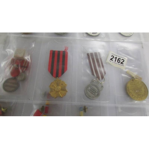 2162 - Approximately 20 military and other medals with ribbons, (mainly restrikes).