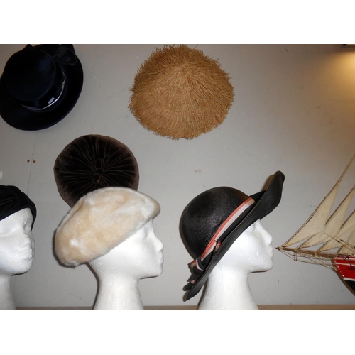 357 - A large quantity of ladies vintage hats, 13 in total, heads not included