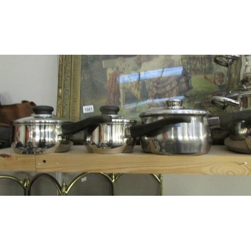 1091 - A set of four good quality stainless steel saucepans and four other stainless steel sauce pans.