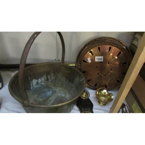 1099 - A copper warming pan, a brass jam pan, horse brasses etc.,