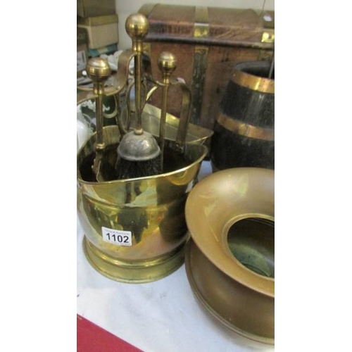 1102 - A mixed lot of brass ware including log box, small coal scuttle etc.,