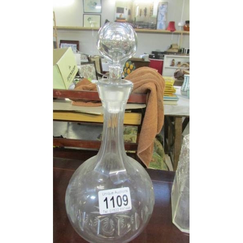 1109 - Four cut glass decanters.