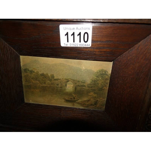 1110 - Three oak framed pictures and one other.