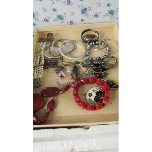 2093 - A large selection of necklaces, some Egyptian design, and various other costume jewellery including ... 