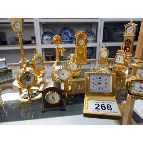 268 - A good collection of miniature clocks, mainly brass, 1 Border Fine Arts, which has a few minor chips... 