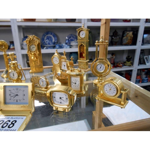 268 - A good collection of miniature clocks, mainly brass, 1 Border Fine Arts, which has a few minor chips... 