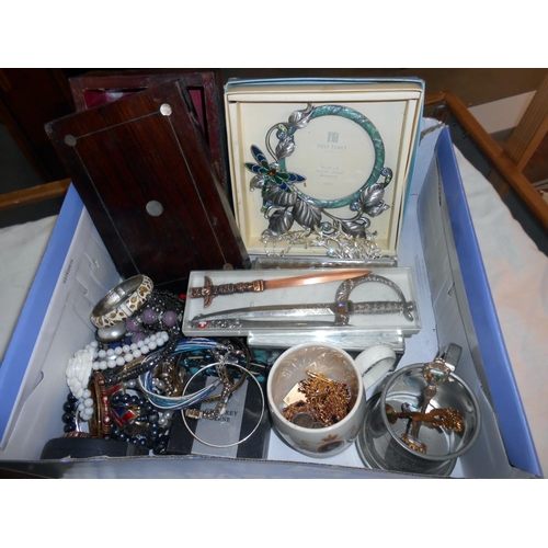 269 - 2 boxes of costume jewellery including an old box, letter openers etc.