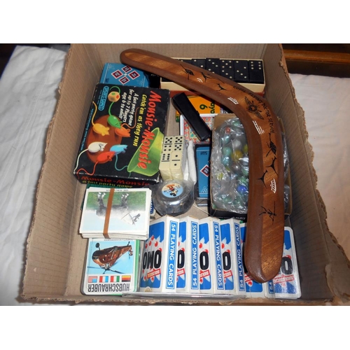 275 - A quantity of misc, including dominoes, marbles, bicycle bell, boomerang etc.