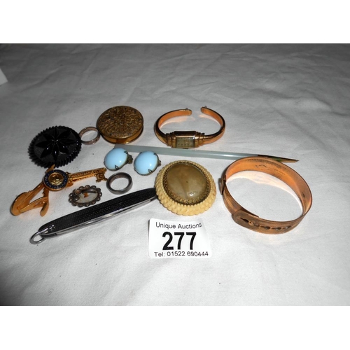 277 - A mixed lot including watch, bracelet, brooches etc.