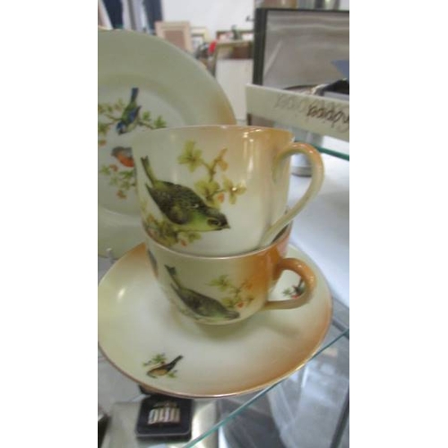 1127 - 14 pieces of Victoria tea ware hand painted with birds.