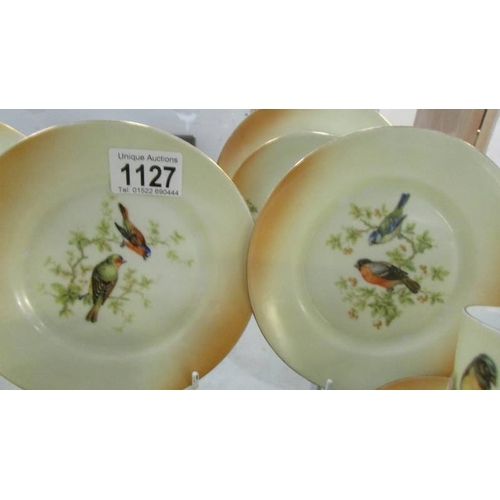 1127 - 14 pieces of Victoria tea ware hand painted with birds.