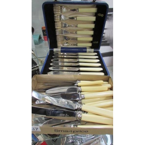 1137 - A cased set of fish knives and forks together with other assorted cutlery items.