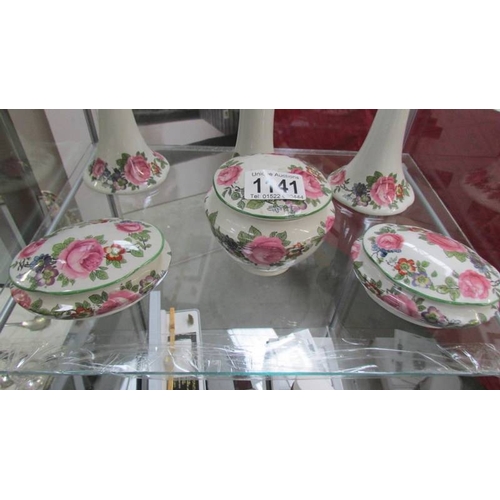 1141 - A six piece floral dressing table set.