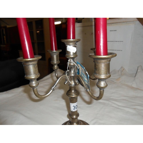 300 - A Dutch silver plated 5 arm candleabra