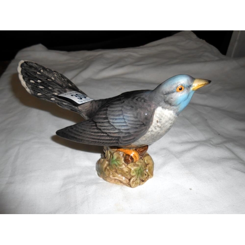 304 - A Beswick Cuckoo, model 2315, brown and grey with gloss finish, restoration to beak, height to tip o... 