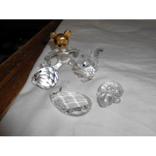 305 - 2 glass candle holders in good condition and a quantity of Swarovski, (all a/f)