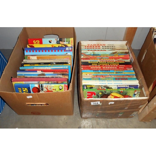 324 - 2 boxes of vintage childrens annuals including Tarzan, Space 1999, Roy of the Rovers etc.