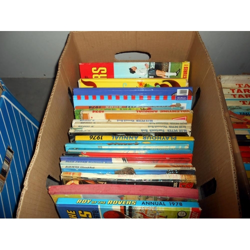 324 - 2 boxes of vintage childrens annuals including Tarzan, Space 1999, Roy of the Rovers etc.