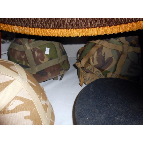 343 - 5 military helmets/caps including No.1 dress RAF officer and H.M. Submariner cap, all need cleaning ... 