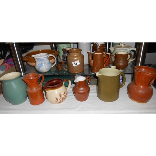 355 - A large quantity of pottery including Denby, Chris Aston, Royal Worcester, Honiton etc, 2 pieces hav... 