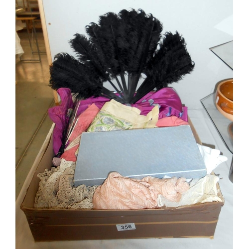 356 - A box of assorted textiles including lace, dresses, accessories a/f