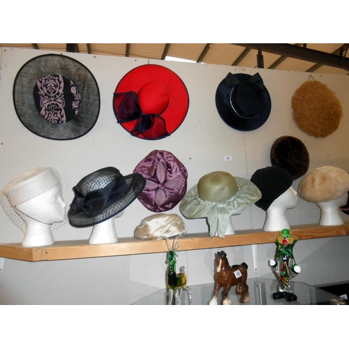 357 - A large quantity of ladies vintage hats, 13 in total, heads not included