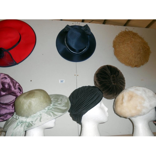 357 - A large quantity of ladies vintage hats, 13 in total, heads not included