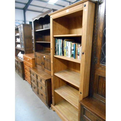 375 - A solid pine 5 shelf book case, Height 183.5cm, width 77cm approx.