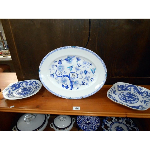 393 - A quantity of blue and white dinner ware including a meat platter and tureens, 1 a/f, plus other din... 