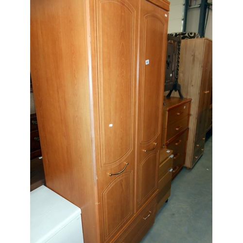 402 - A 2 door Alstons furniture wardrobe with drawer at bottom, height 190cm, width 76.5cm approx.