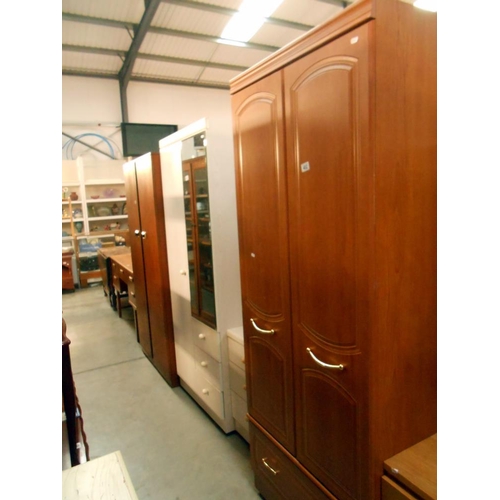 402 - A 2 door Alstons furniture wardrobe with drawer at bottom, height 190cm, width 76.5cm approx.