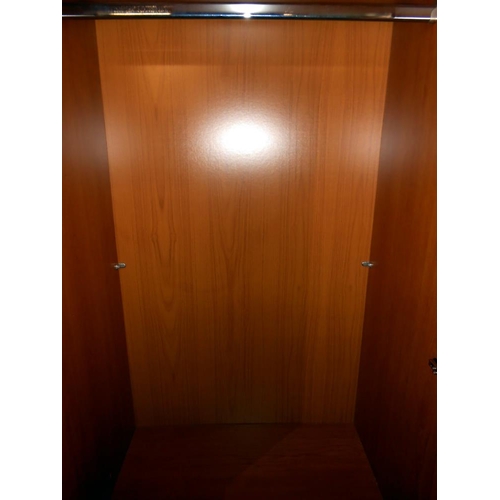 402 - A 2 door Alstons furniture wardrobe with drawer at bottom, height 190cm, width 76.5cm approx.