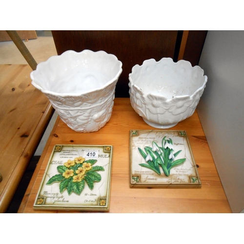 410 - 2 white planters 18cm & 15cm and 2 hand painted floral wall plaques 17cm x 16cm